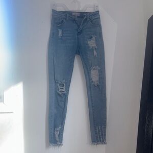 Distressed Blue Jeans
